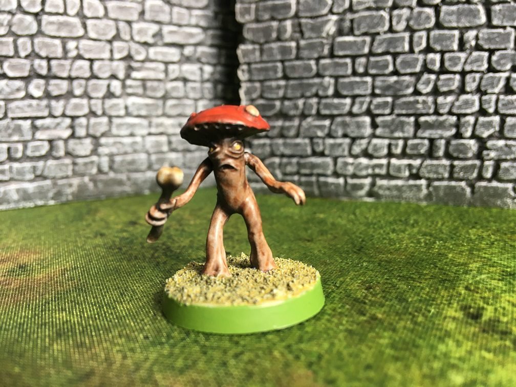 fungus man with bone. 3 miniature wargaming podcast recommendations